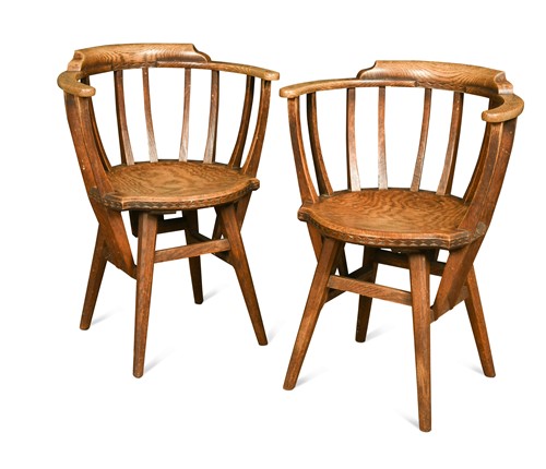 Lot 252 - Arthur Romney Green (1872-1945), a pair of Arts & Crafts oak armchairs, circa 1920