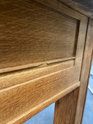 Lot 280 - Attributed to Heal's, an Art Deco limed oak partner's desk, circa 1925