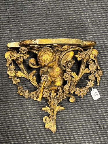Lot 442 - A mid 19th century gilt wood figural wall...
