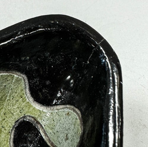 Lot 69 - Derek Davis (1926-2008), a canoe-shaped dish, circa 1950
