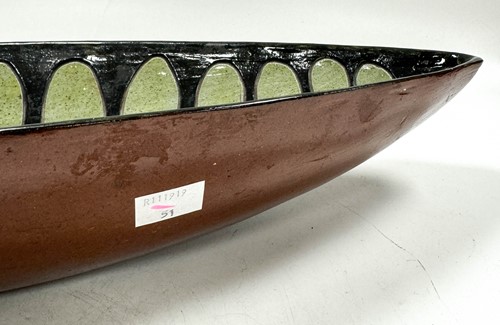 Lot 69 - Derek Davis (1926-2008), a canoe-shaped dish, circa 1950