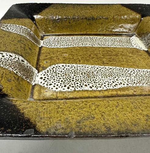 Lot 59 - Louis Hanssen (1934-1968), a large square dish