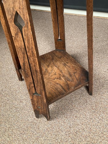 Lot 240 - An Arts & Crafts oak side table, circa 1900