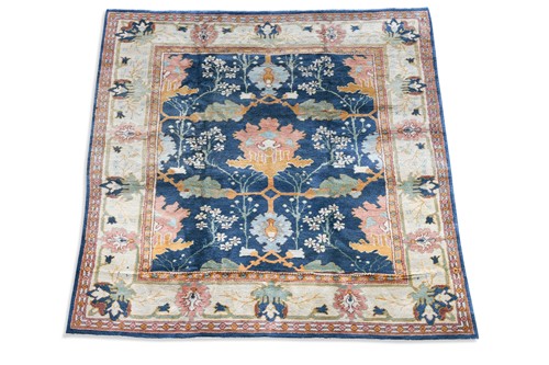 Lot 244 - Liberty & Co., an Arts & Crafts style carpet, modern