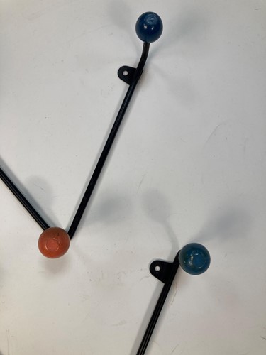 Lot 334 - A pair of mid-century 'atomic' coat hooks