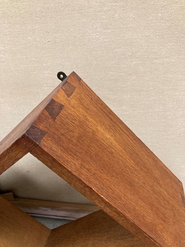Lot 278 - An Art Deco pale oak hanging shelf, circa 1930