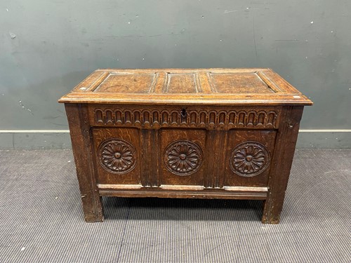 Lot 377 - A 18th century and later coffer with fielded...