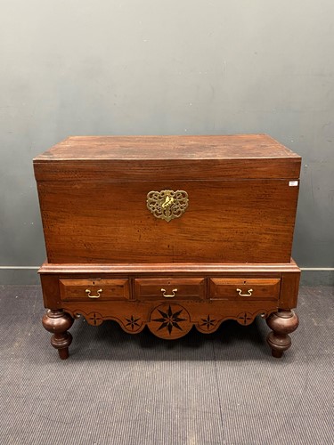 Lot 389 - A large hardwood trunk on stand fitted with...