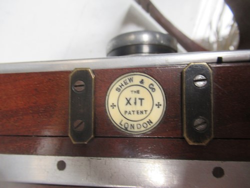 Lot 40 - A Shew & Co XIT Patent quarter plate camera,...