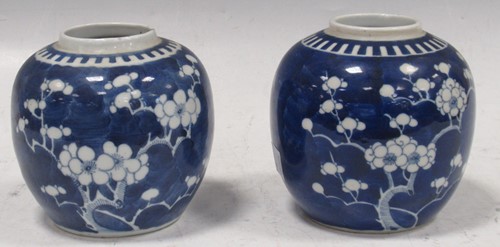 Lot 8 - Two similar Chinese prunus blossom jars, one...