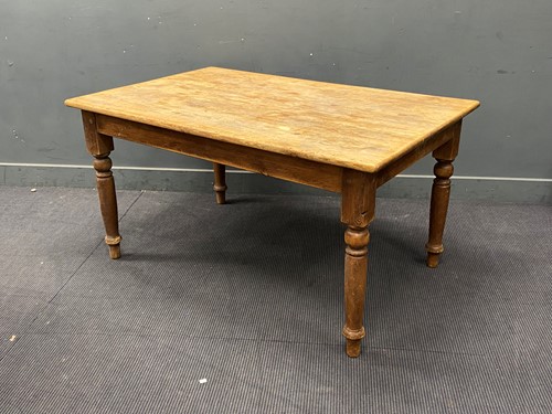 Lot 363 - A 20th century pine farmhouse table on turned...