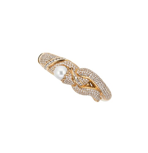 Lot 27 - A pearl and diamond set hinged bangle