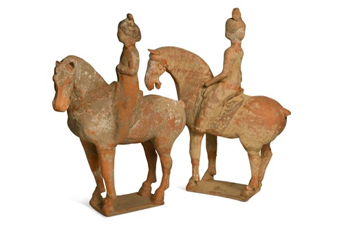 Lot 5 - Two Chinese terracotta horses with female riders, Tang Dynasty or later