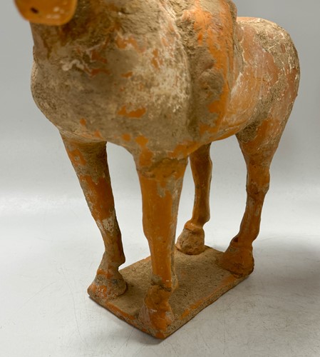 Lot 5 - Two Chinese terracotta horses with female riders, Tang Dynasty or later
