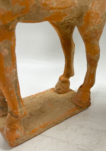 Lot 5 - Two Chinese terracotta horses with female riders, Tang Dynasty or later