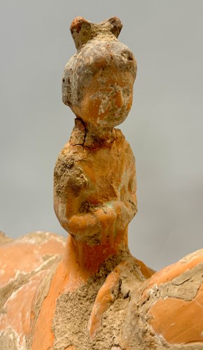 Lot 5 - Two Chinese terracotta horses with female riders, Tang Dynasty or later