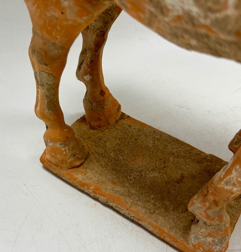 Lot 5 - Two Chinese terracotta horses with female riders, Tang Dynasty or later