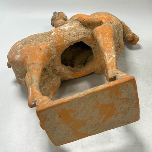 Lot 5 - Two Chinese terracotta horses with female riders, Tang Dynasty or later