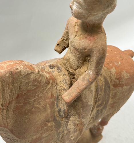 Lot 5 - Two Chinese terracotta horses with female riders, Tang Dynasty or later