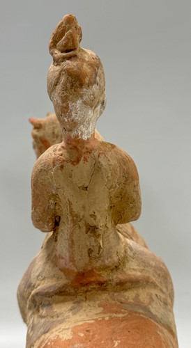 Lot 5 - Two Chinese terracotta horses with female riders, Tang Dynasty or later