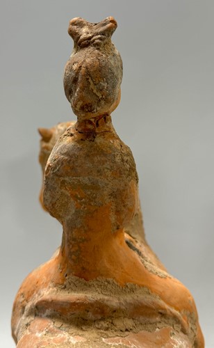 Lot 5 - Two Chinese terracotta horses with female riders, Tang Dynasty or later