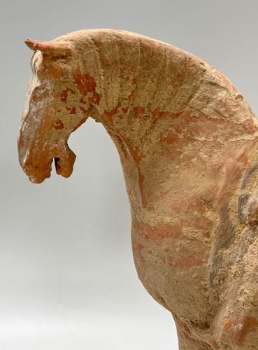 Lot 5 - Two Chinese terracotta horses with female riders, Tang Dynasty or later