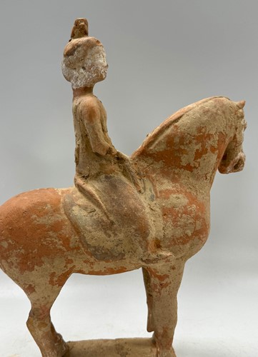 Lot 5 - Two Chinese terracotta horses with female riders, Tang Dynasty or later