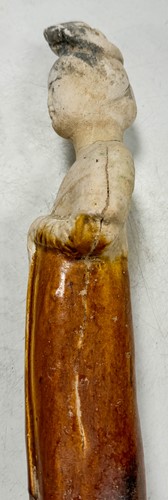 Lot 7 - A group of four Chinese partly straw-glazed pottery lady court attendants, Tang Dynasty