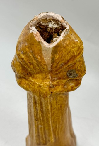 Lot 7 - A group of four Chinese partly straw-glazed pottery lady court attendants, Tang Dynasty