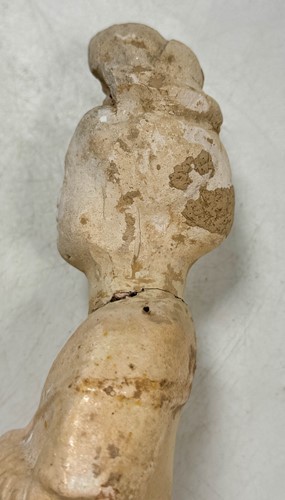 Lot 7 - A group of four Chinese partly straw-glazed pottery lady court attendants, Tang Dynasty