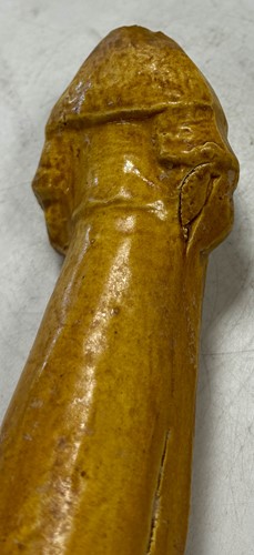 Lot 7 - A group of four Chinese partly straw-glazed pottery lady court attendants, Tang Dynasty