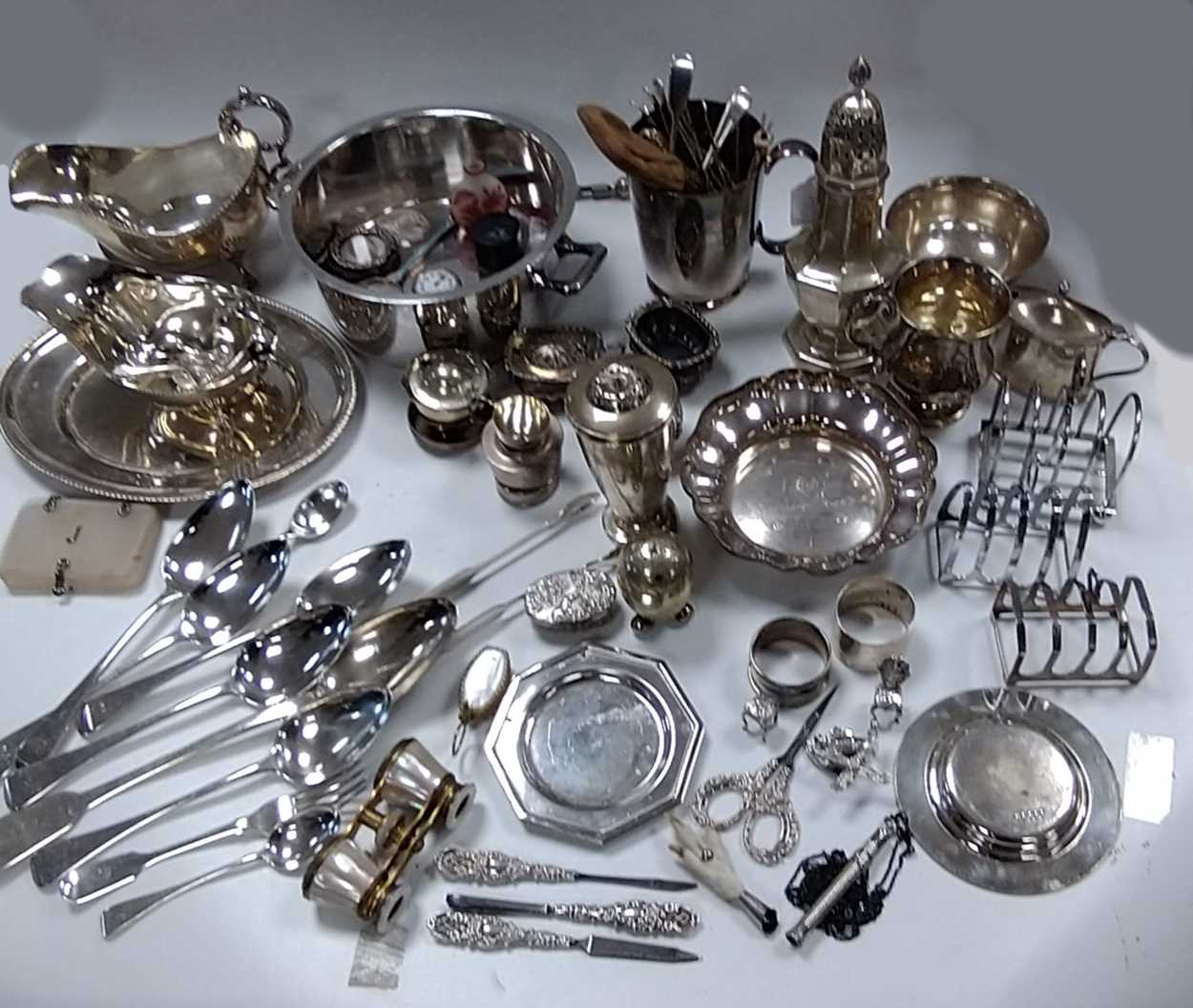 Lot 210 - A collection of silverware including