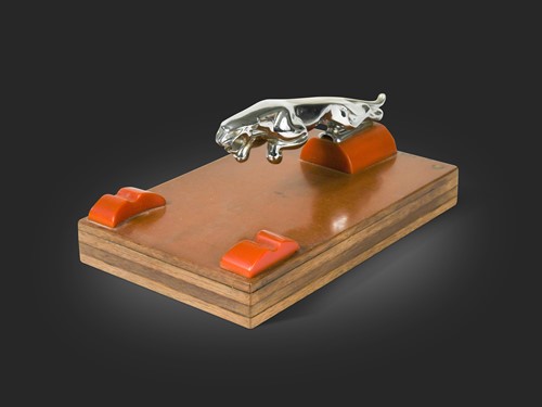Lot 36 - A chrome and bakelite Jaguar desk stand