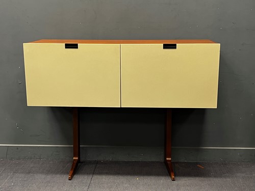 Lot 397 - A 20th century teak and white lacquered...
