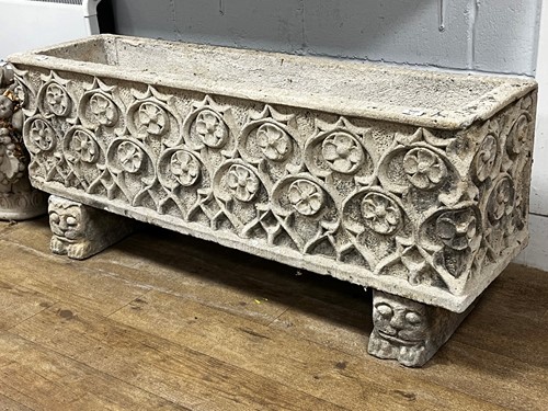 Lot 476 - A composite stone garden planter in the Gothic...