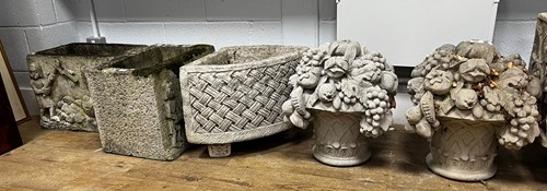 Lot 477 - A pair of composite stone garden finials...