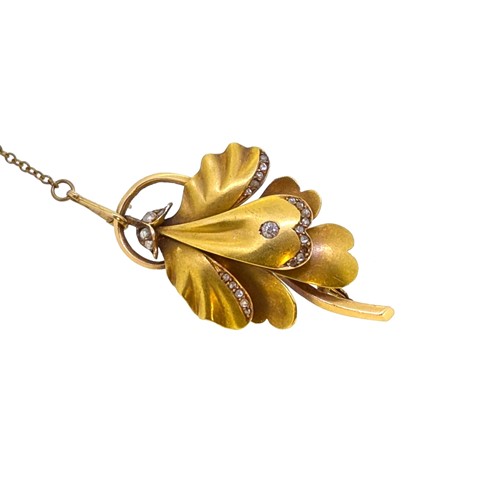 Lot 76 - A diamond set orchid brooch