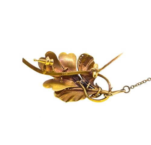 Lot 76 - A diamond set orchid brooch