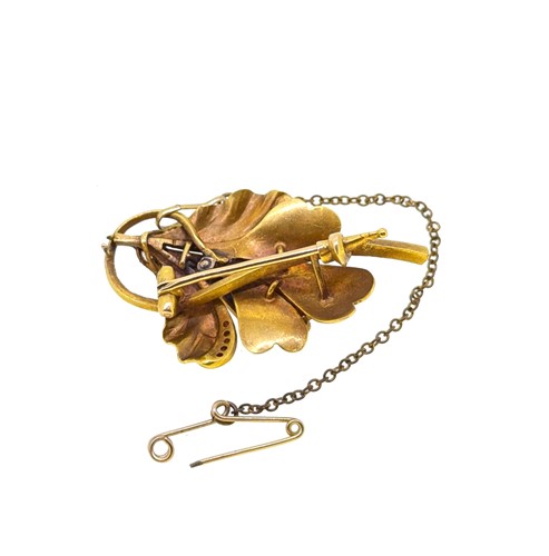 Lot 76 - A diamond set orchid brooch
