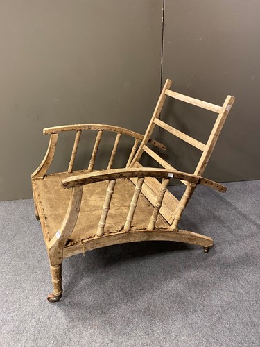 Lot 435 - A Georgian reclining armchair with curved arms...
