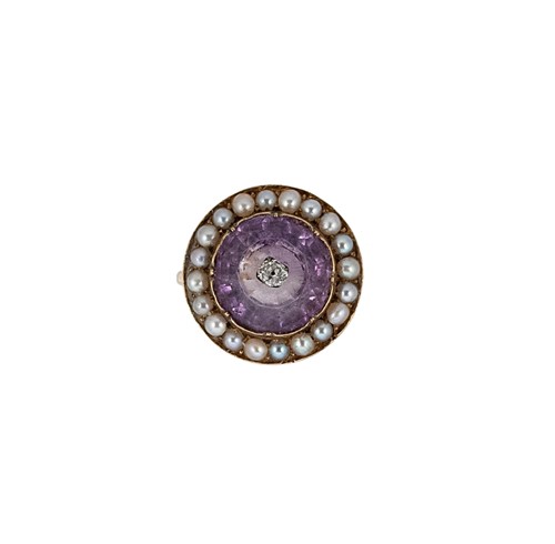 Lot 33 - An amethyst, diamond and pearl target style ring