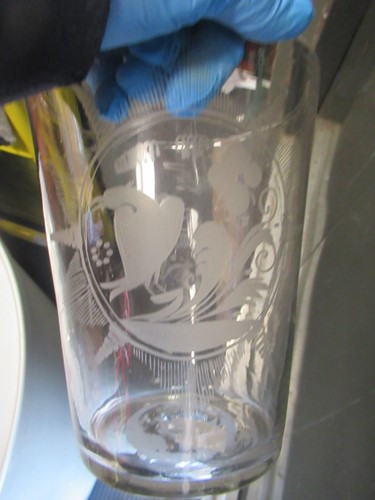 Lot 19 - A 19th century glass vase engraved with a bird,...