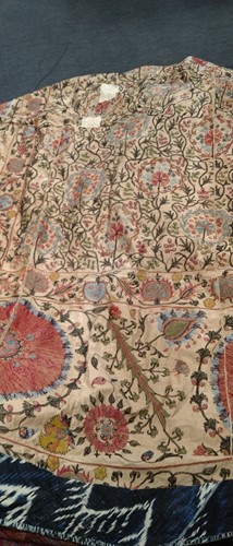 Lot 73 - An 19th century embroidered Suzani panel,...