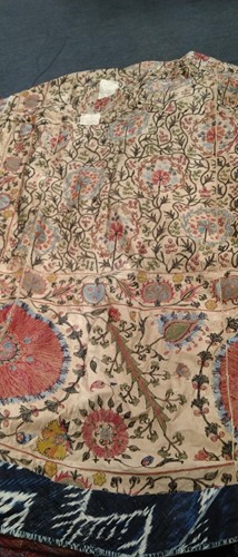 Lot 73 - An 19th century embroidered Suzani panel,...