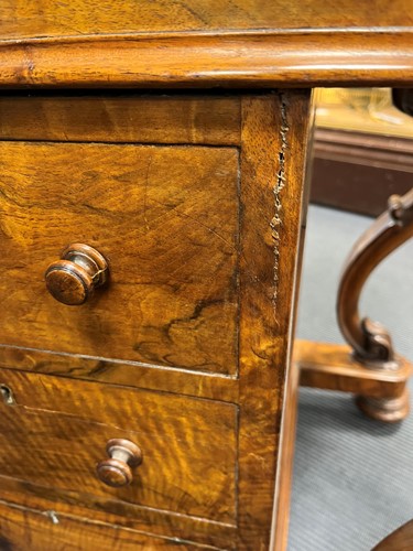 Lot 617 - A Victorian burr walnut piano top davenport