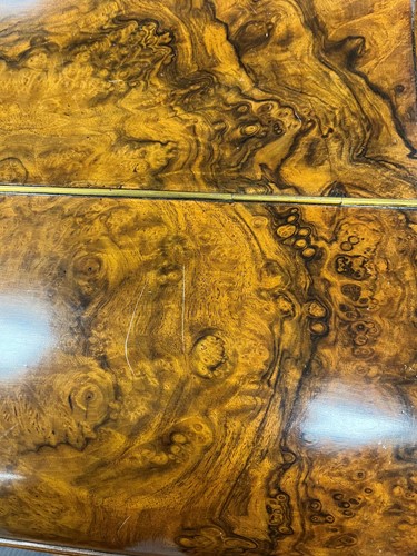 Lot 617 - A Victorian burr walnut piano top davenport