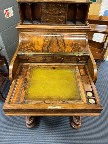 Lot 617 - A Victorian burr walnut piano top davenport