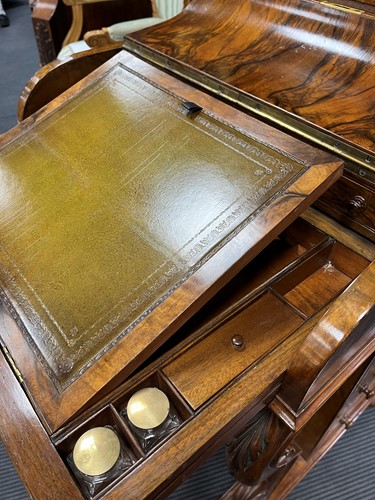 Lot 617 - A Victorian burr walnut piano top davenport