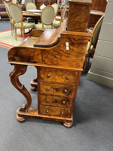 Lot 617 - A Victorian burr walnut piano top davenport