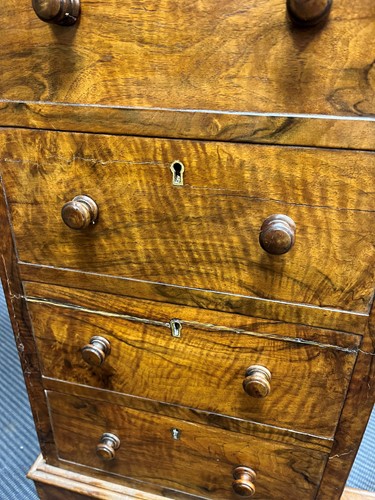 Lot 617 - A Victorian burr walnut piano top davenport